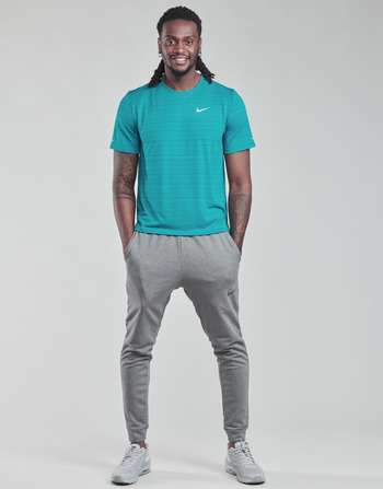 Oblačila Moški Spodnji deli trenirke  Nike DF PNT TAPER FL Siva / Črna