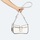 Torbice Ženske Torbe Munich CROSSBODY BAGUETTE MH Bela