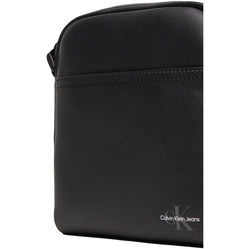 Calvin Klein Jeans MONO LOGO REPORTER 18 LV04G3014G Črna